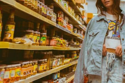 Woman browsing an isle at a grocery store