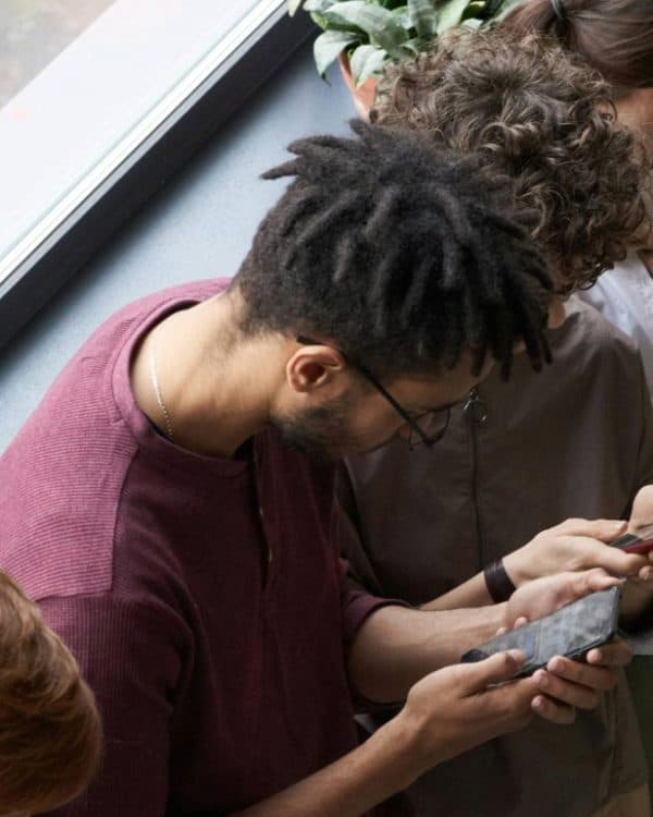 People sitting down browsing their phones