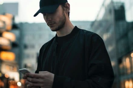 person looking down on his phone